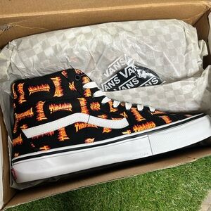 Vans Black High-Top Sneakers with Red and Yellow Accents